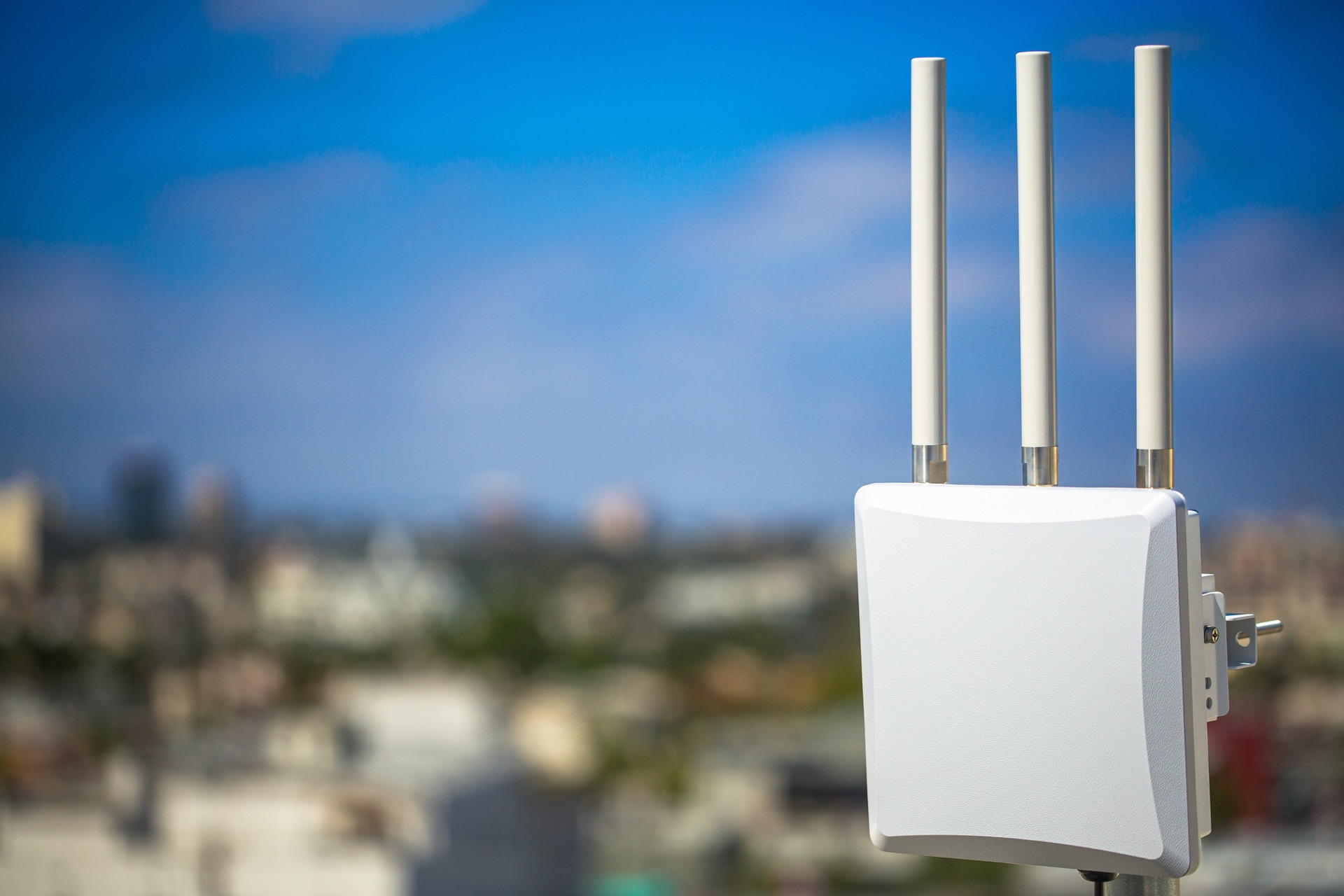 A FliteGrid sensor installed outdoors with a clear view across the city